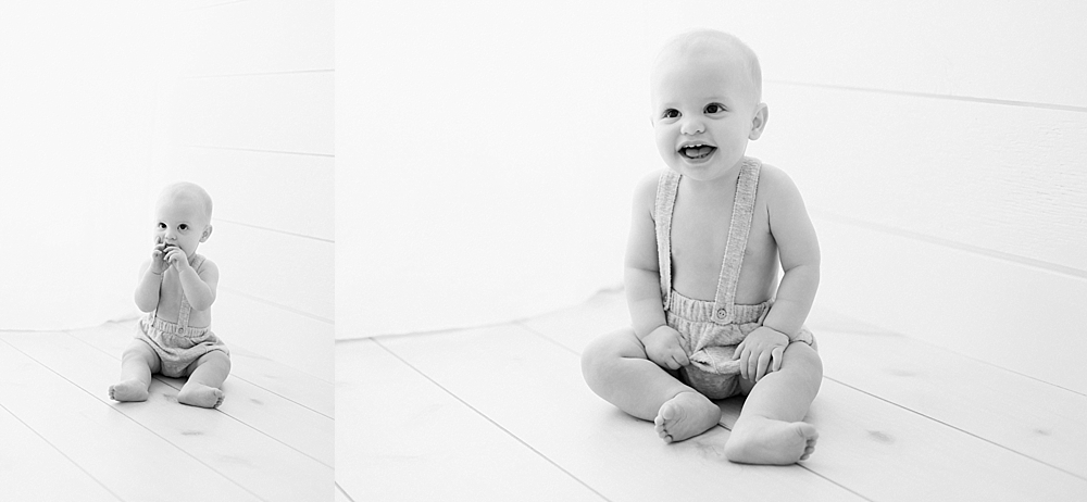 9 month old baby boy smiling in grey Zara overalls in natural light studio by Tampa family photographer Marisa stone photography